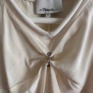 Phillip Lim silk blouse with “piercing” details